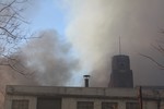 The tower on the Firth Carpet mill was surrounded by smoke.