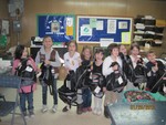 Scouts prepare our Hero Packs  last Saturday at the Scout Cabin.
