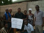 Villagers show their appreciation for Father Peter's work.