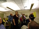 Melissa Vellone (center) asked other village residents to stand to show their concern about how the DPW project was handled.