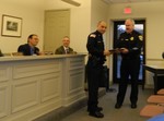 Officer Pena (l) receives a citation from Chief Dixon of the Cornwall-on-Hudson Police Dept.