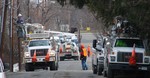 Five Verizon trucks were at work on Duncan Avenue