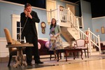 Leading Ladies at CCHS, photo provided. Duncan (James Gillick) makes a phone call as his fiancee, Meg (Hannah Fabiny) looks on.