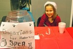 Carly Neville collects donations for HVSPCA.