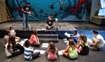 Seth Soloway, owner of Railroad Playhouse Classroom Playmaking Project, with his students.