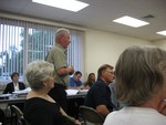 A resident speaks at planning board hearing
