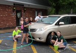 Photo by Jim Lennon. Middle School students held car wash.