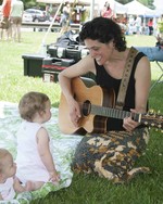 Photo by Wynn Gold. Story Laurie entertains at RiverFest 2013.