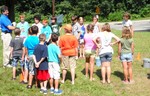 Photo by Jim Lennon. Cornwall Baptist Church Pastor Rev. Steven J. Racite organizes participants into groups during play time.