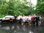 Photo by Jim Lennon.Sgt. Dave Campbell (kneeling) & K-9 Scout, Deputy J. Yela (standing) & K-9 Keegan, Beacon PD Police Officer C. Allencastro & K-9 Ike, Warwick Police Officer Vincent Cossentino & K-9 Tank and Norfolk and Southern Railroad Police Officer Paul Couser (far right) & J-9 Pepik. Also in photo to far right in Ted shirt is Joe Racite (retired Carneys Point, N.J. Deputy Chief and Pastor Racite's father) in red shirt and in blue shirt Retired Glassboro  N.J. Police Sergeant John DeHart, along with children in camp. 