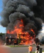 Photo by Jim Lennon.  Fire Destroys New Windsor Home. 5.