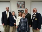 Photo by Jim Lennon. L to R:Jeff Knight, Cornwall Lions Club, Ilene Wizwer, District 20-0 Peace Poster Contest Chair, Kristin Gagnon, Jonathan's Mother,Jonathan Gagnon, Peace Poster Contest winner,Mark Gagnon, Jonathan's Father, and Clifford W. Youngs, past District 20-0 Governor.  Jonathan's winning entry 
