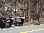 Photo by Jim Lennon. Rollover on Mineral Springs Rd.