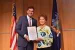 Elizabeth ?Betty? Longinott receives the 99th Assembly District Women of Distinction award. 