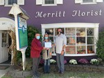 Assemblyman Colin Schmitt presents certificate of merit to owner Betsy Sharo and her husband, Ray.